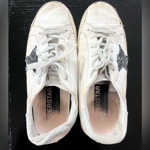 Golden Goose Superstars in white leather with black glitter stars. Size 40.